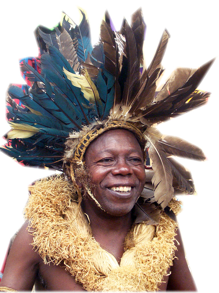 portrait of a tribal man wearing feather on head
